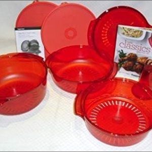 NEW Tupperware Stack Cooker in red. Recipe book.